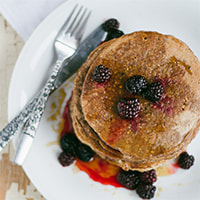photo of whole grain buttermilk pancakes with berries